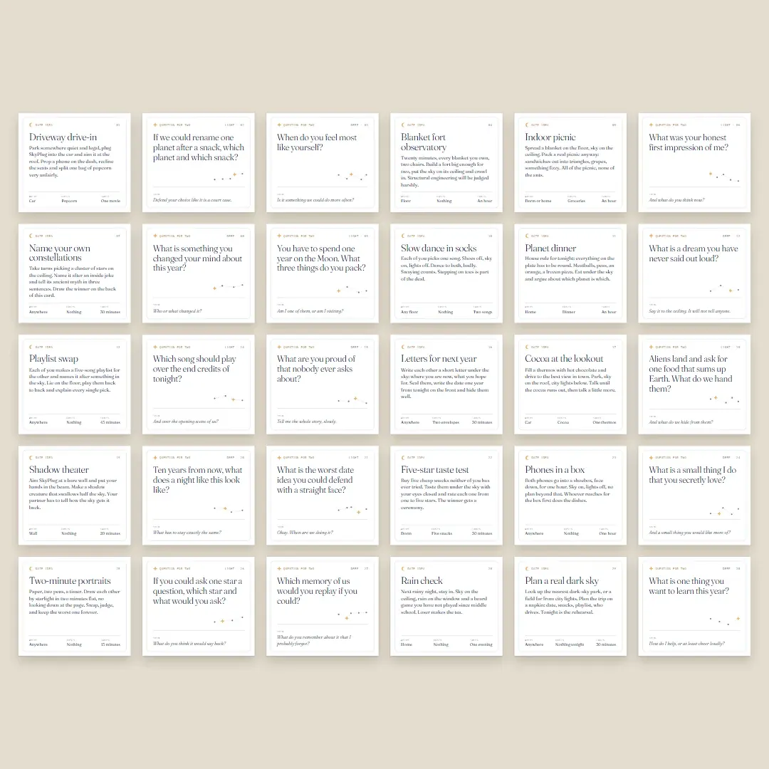 All 30 cards laid out in rows, date ideas and questions, black text on white with small star marks.